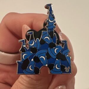 2025 WDW pin featuring Cinderella's Castle filled with Sorcerer Mickey hats